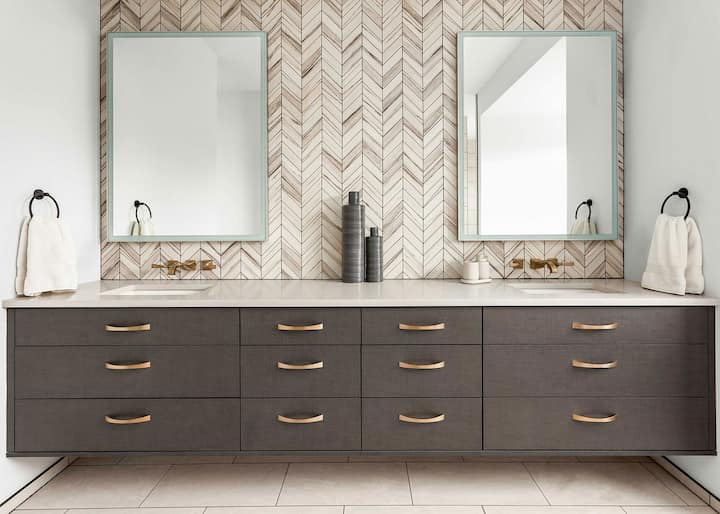 Bathroom tile is used to create a stunning backsplash in a Whittier, CA bathroom.